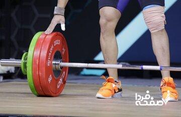 عکس | کوچ قهرمان وزنه‌برداری به بحرین!